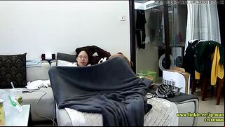 Asian caught sister is trying to hide from the hidden cam while masturbating