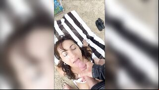 Big cumshot on wifes face at the beach