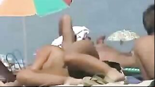 Busty And Shameless Amateur Beach Babe With Stunning Nude Bottom!